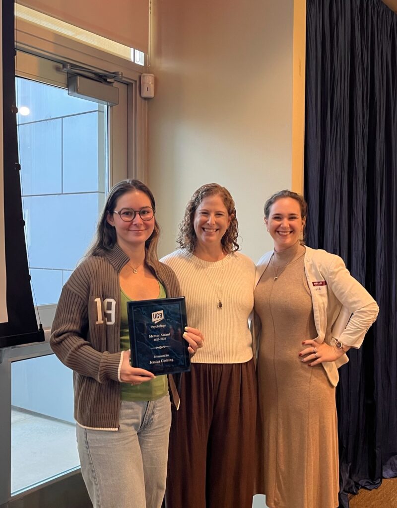 Jessica Golding holding the UCR Psychology Mentor Award for 2025–2026